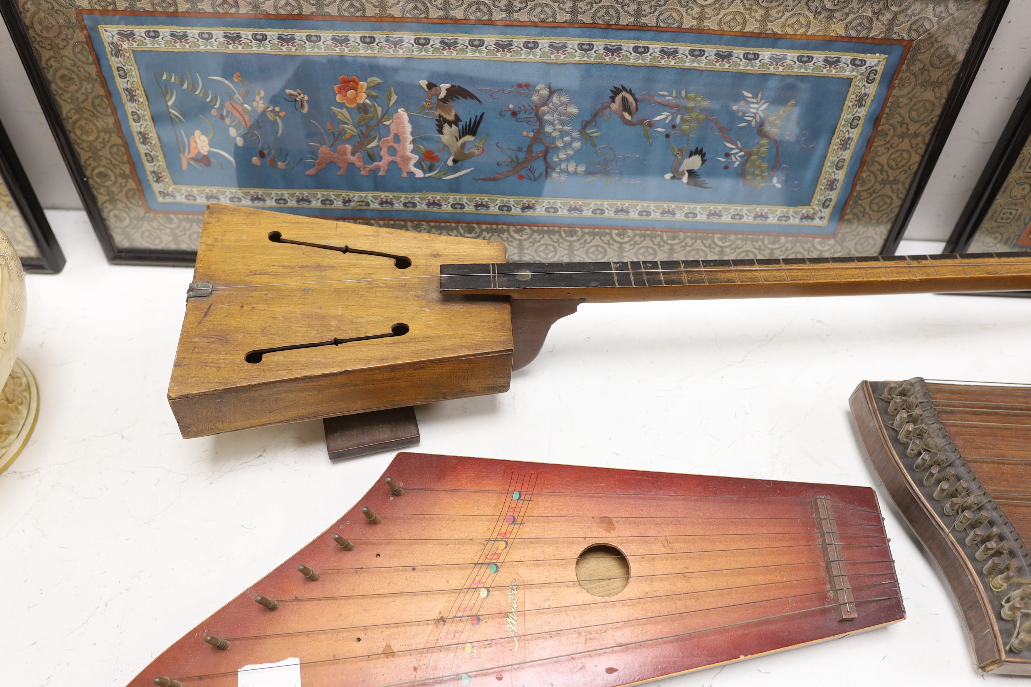 A single string fiddle, a zither and a Golden Music zither
